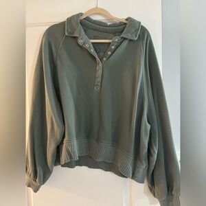green button sweater